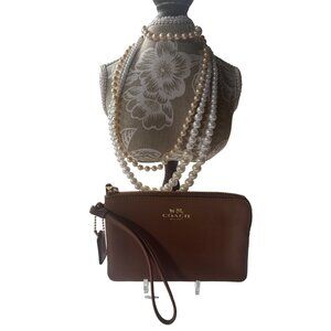 Coach Zip Wristlet Pebbled Leather Saddle